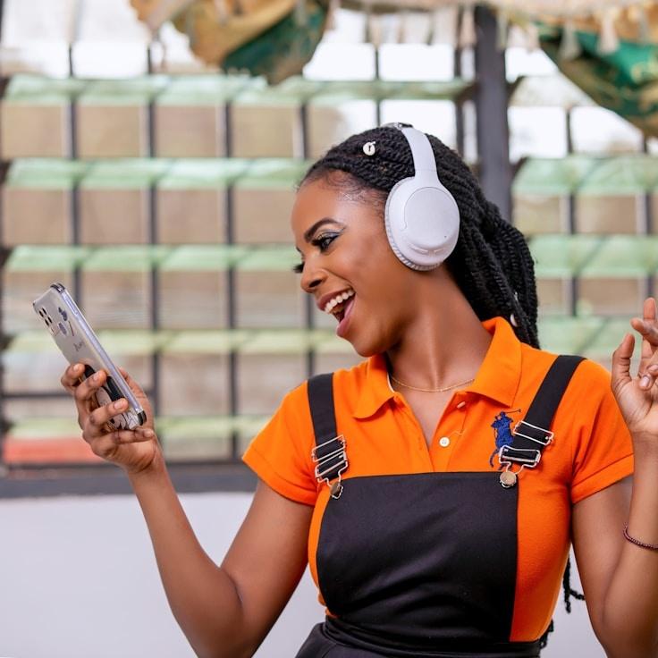 Avery Kim, Lead Design Curator at Garden Ridge Oak, reviewing corporate floral arrangements